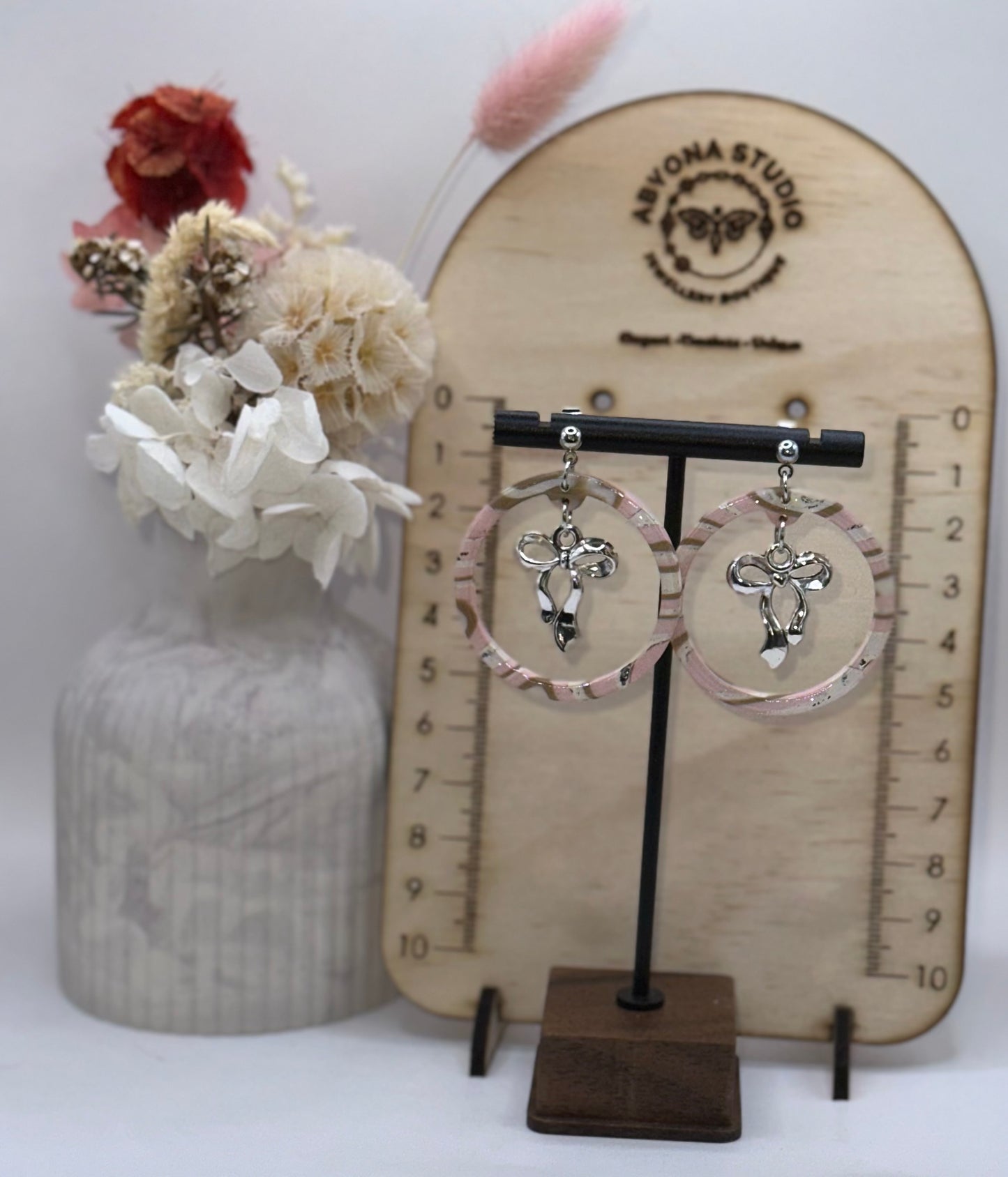 Circle Drop with Bow Charm